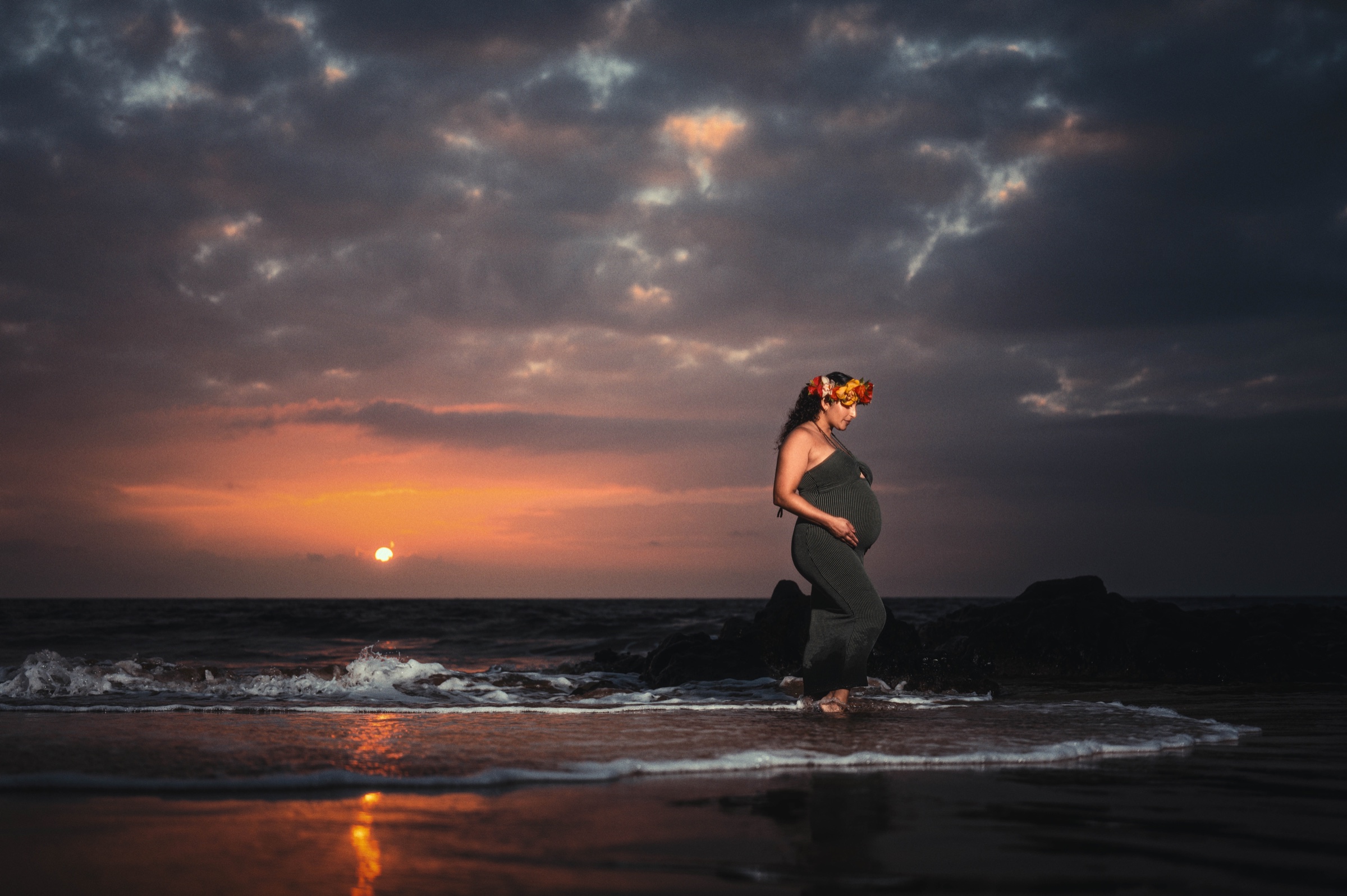 Maternity portrait against a dramatic Maui sunset